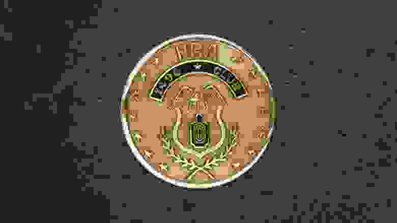 1490 Medallion on a Dark Background